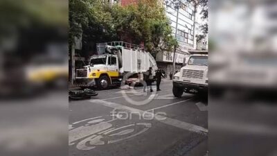 URGENTE: Motociclista muere arrollado por un pesado camión de basura