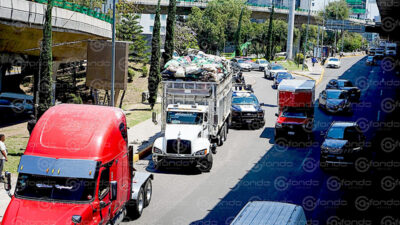 TRAGEDIA. Hermanos iban arriba de un camión cargado de basura; pasaron por un puente y murieron al golpearse la cabeza
