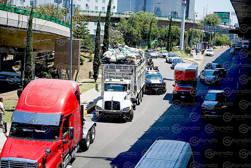 TRAGEDIA. Hermanos iban arriba de un camión cargado de basura; pasaron por un puente y murieron al golpearse la cabeza