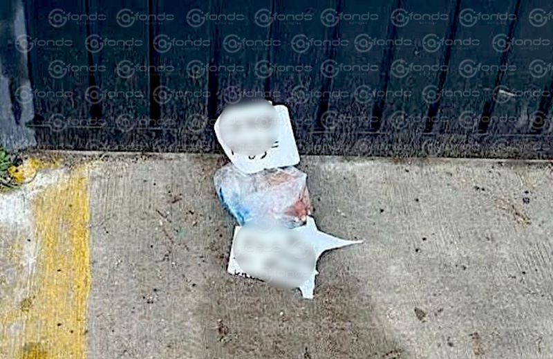ATERRADOR. Dejan una mano con un mensaje frente a una casa en el Estado de México