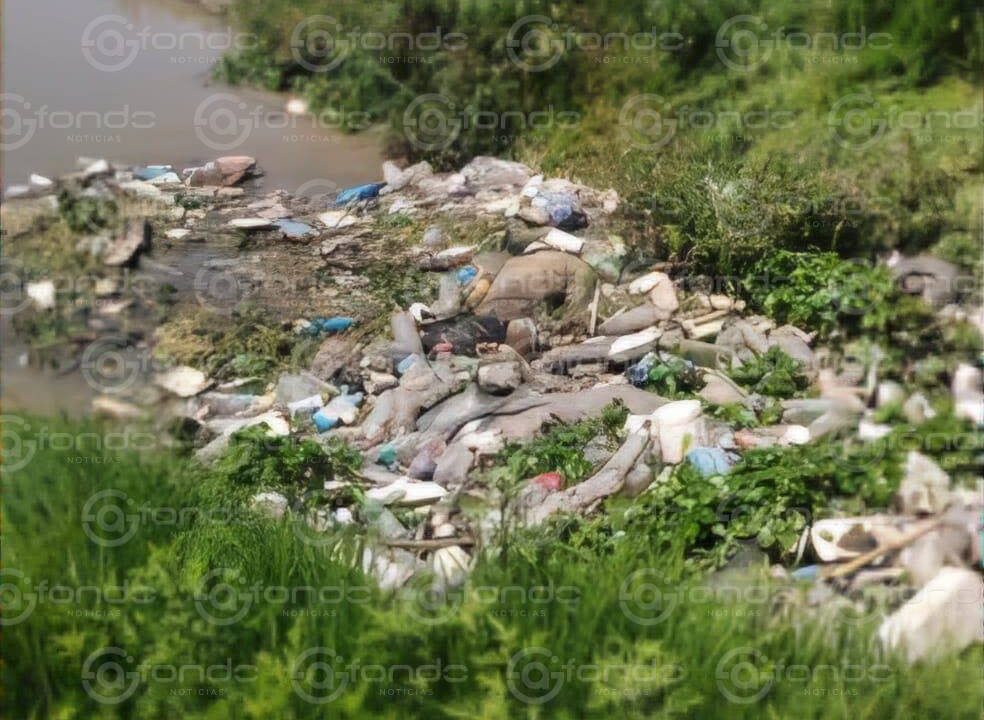 MACABRO. Un cuerpo atado y amordazado se descomponía entre basura y aguas negras